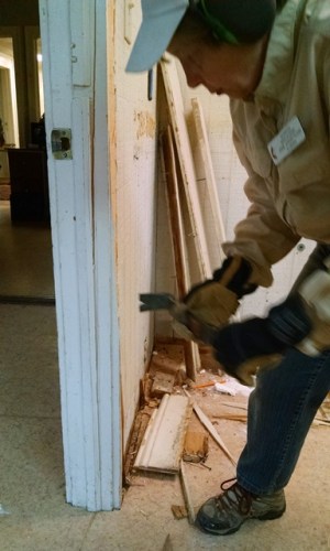 Anne removing door trim
