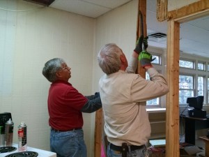 Frank and Max removing wall