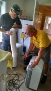 Dave and Morris assembling the new portable air conditioner