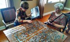 Anne and Nancy working on the puzzle