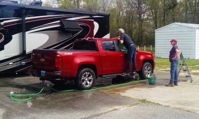 Rita decided she would wash their truck after they arrived