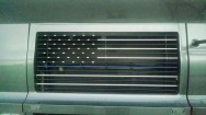 A retired police officer had this police flag painted on his grill while he was here.