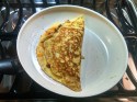 Sausage, onion and cheese omelette