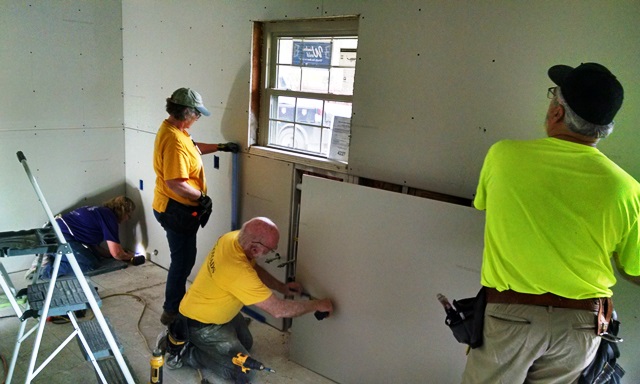 Drywall crew working in the kitchen