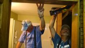 Norm and Tom trimming out a door at Rhonda's
