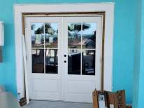 Mark and Max worked on installing this double door